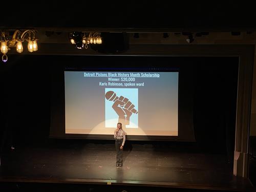 Scholar presenting poetry